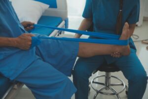 VARDĀN ( Physiotherapy Centre, New Delhi) Therapist guiding a patient through functional movement retraining as part of post-surgical rehabilitation