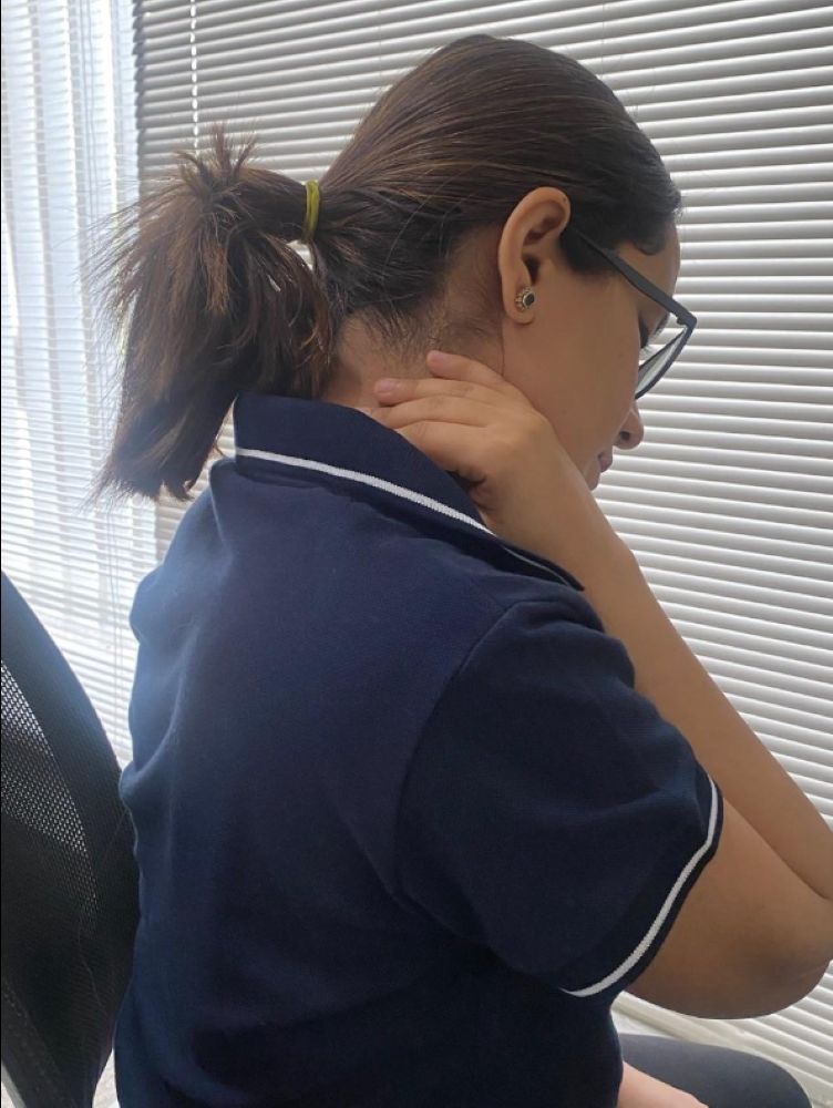 Work-from-home neck discomfort managed through VARDĀN posture correction therapy