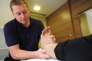 Manual physiotherapy treatment for ankle pain, foot pain, and plantar fasciitis by expert physiotherapists at VARDĀN Physiotherapy Clinic