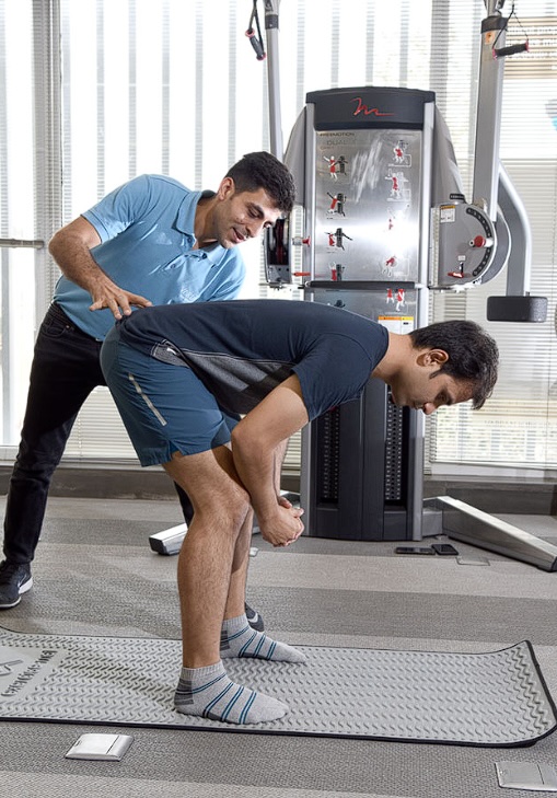 Athlete receiving FMT™ sports physiotherapy for posture correction, injury prevention, and performance enhancement at VARDĀN Physiotherapy